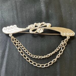 vintage silver-tone floral brooch with chains